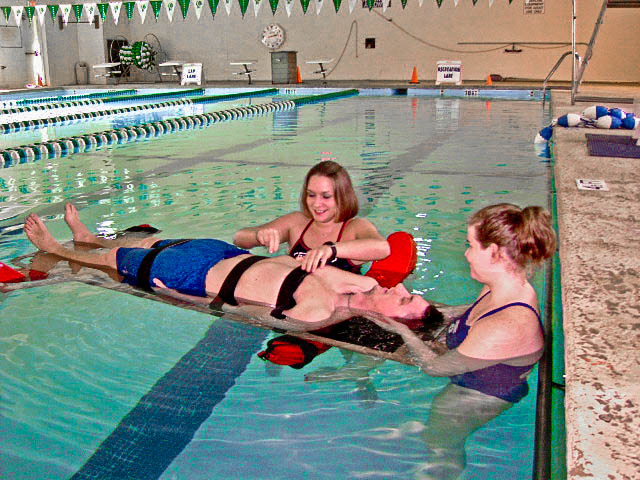 People in pool for CPR AED Class